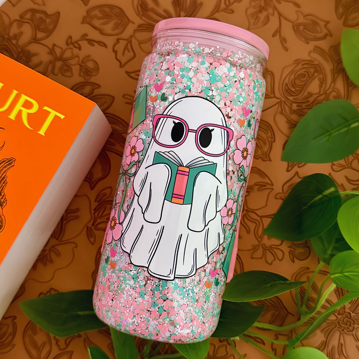 Handmade bookish ghost glitter snow globe tumbler with green pink and white glitter