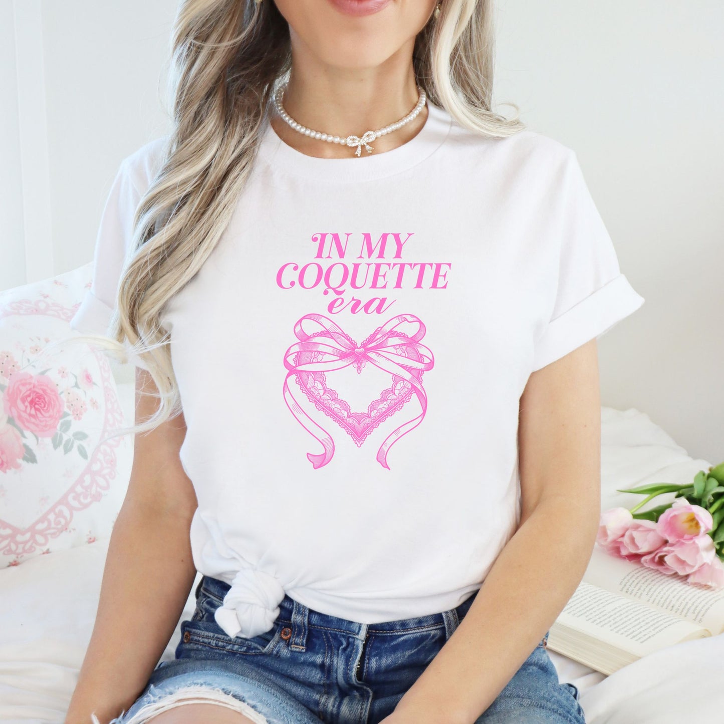 In My Coquette Era white t-shirt 100% cotton with bow and heart design in pink print