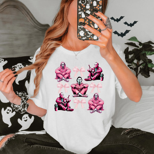 White t-shirt with spooky horror icons and coquette bows
